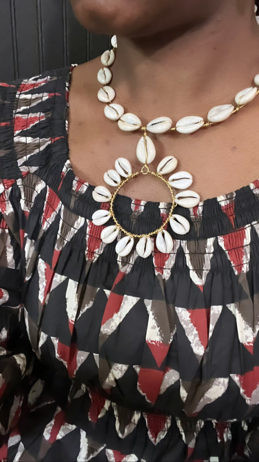 Catarina Cowrie & Brass Bib